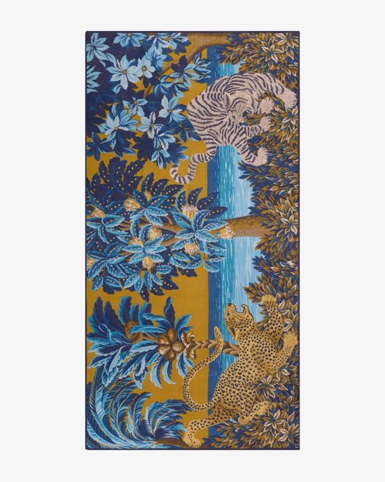 A decorative Etole 100 Chatou Winter Scarf featuring an illustration of a tiger and a leopard within an exotic floral pattern on a blue and yellow background, created by Inoui Editions from 100% Wool.
