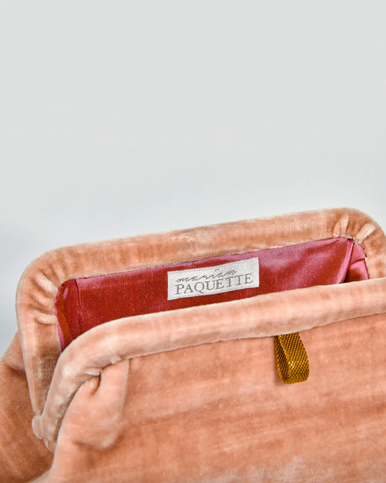 Open Liette Solid Velvet Clutch in Pale Pink displaying a satin-lined interior and Marian Paquette label.