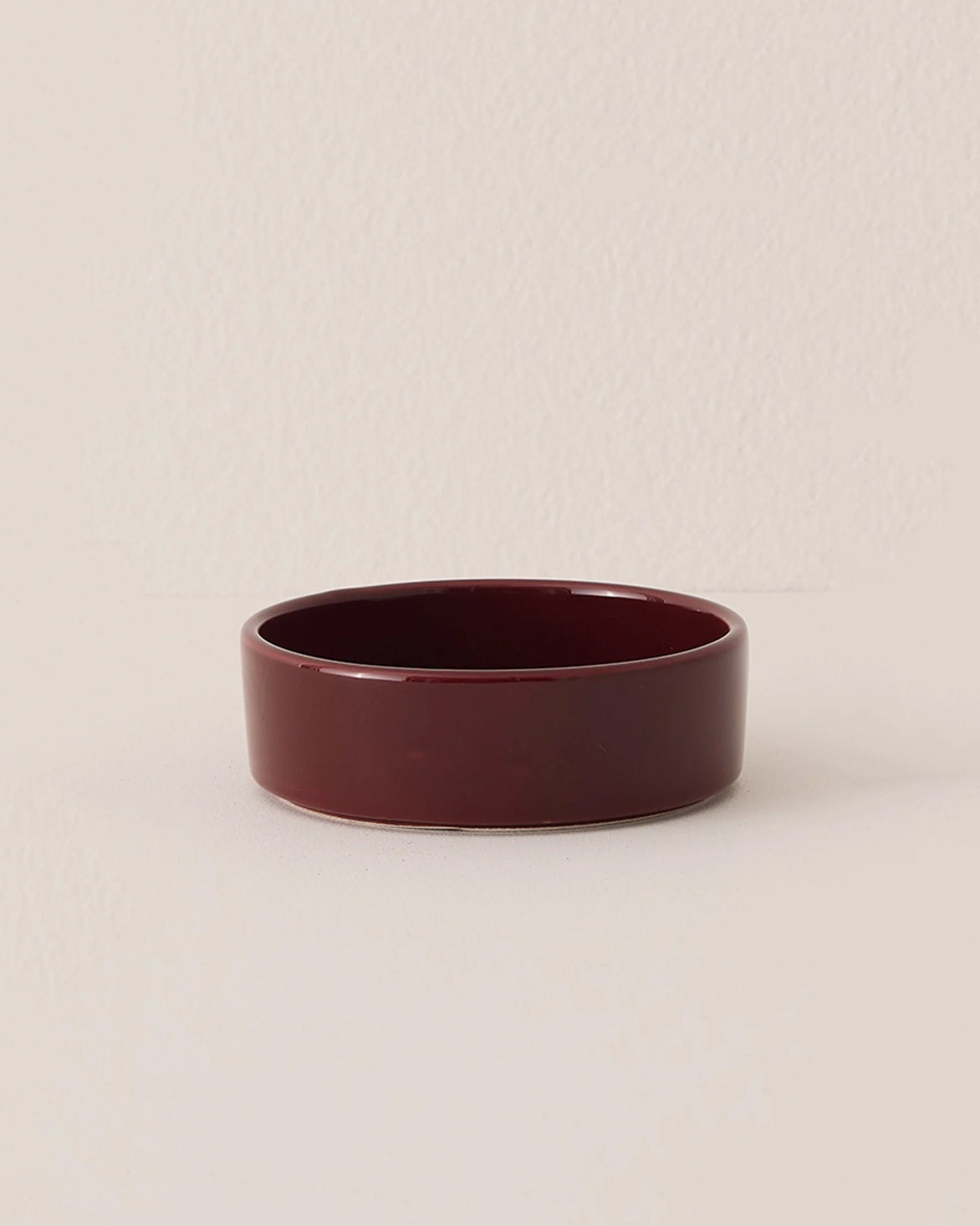 Hoff Glazed 5.5 inch Saucer in Deep Burgundy