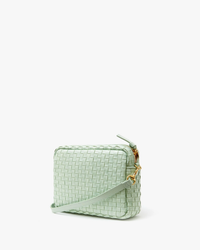 Light green Clare V. Midi Sac in Mist Woven Checker with a crossbody strap on a white background.