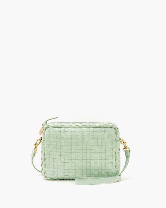 Light green rectangular Clare V. Midi Sac in Mist Woven Checker with a textured surface and a crossbody strap, isolated on a white background.